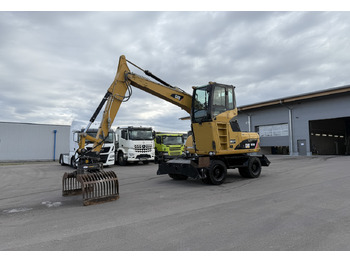 Pelle sur pneus CATERPILLAR M313D