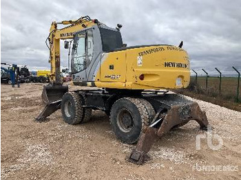 Tractopelle NEW HOLLAND MH5.6