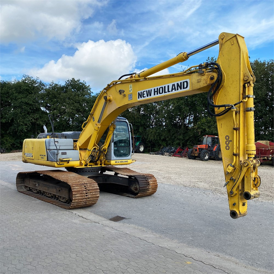 Pelle sur chenille New Holland E 265 B